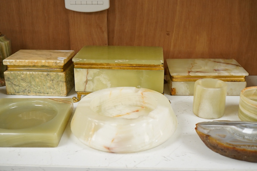 A collection of various onyx collectables to include boxes, vases and table lighters, largest 23cm high